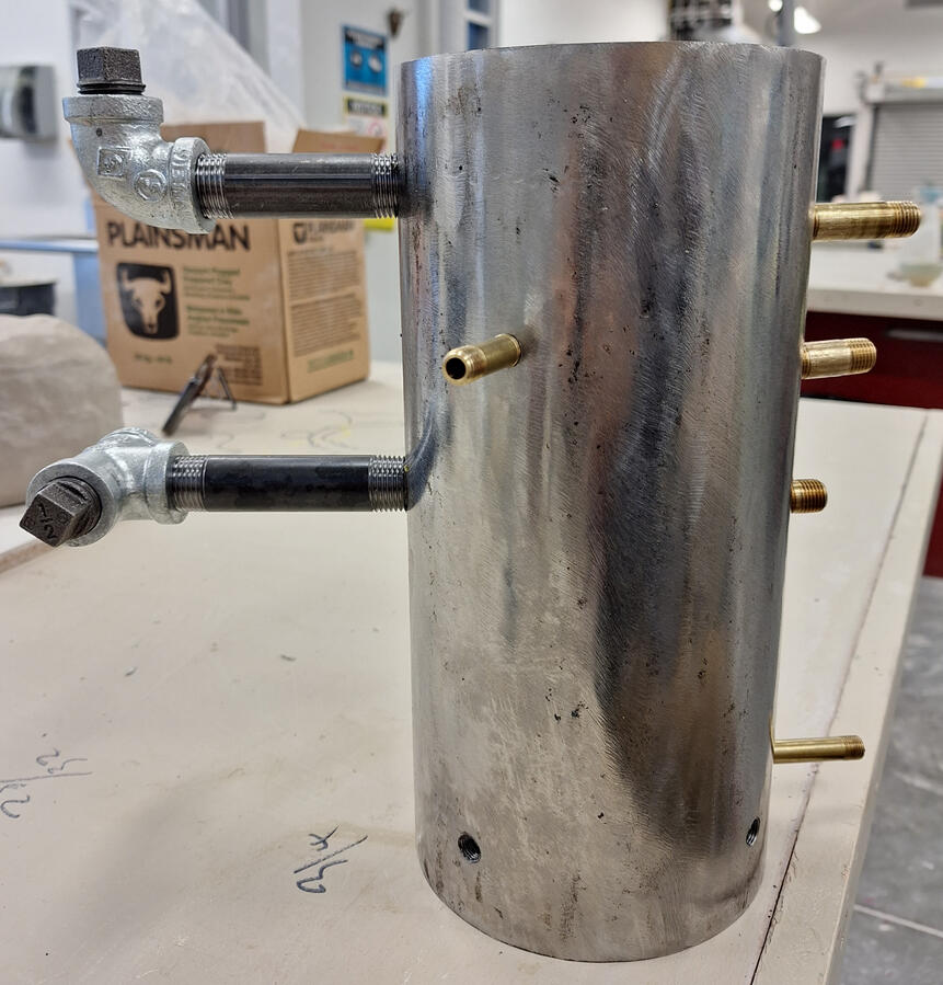 Plumber's Teapot. Sculpture project making a hidden teapot. 2023, steel, iron, brass.