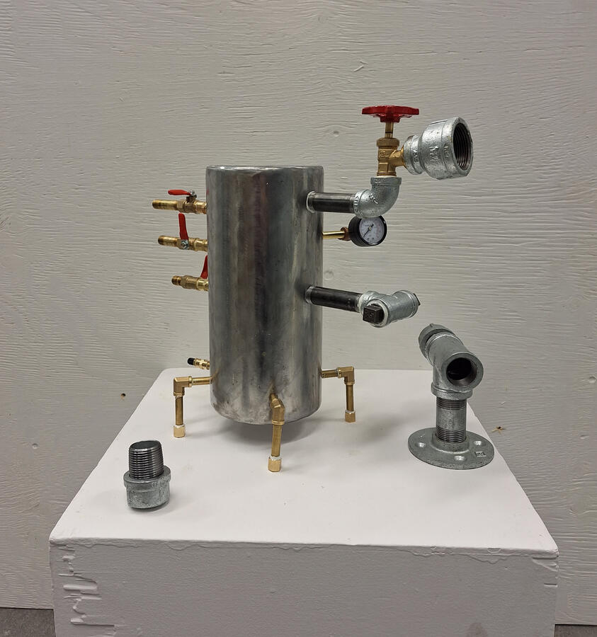 Plumber's Teapot. Sculpture project making a hidden teapot. 2023, steel, iron, brass.