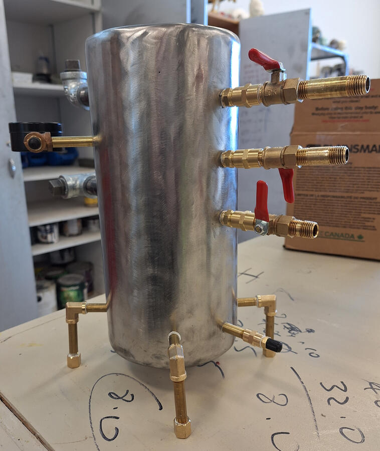 Plumber's Teapot. Sculpture project making a hidden teapot. 2023, steel, iron, brass.