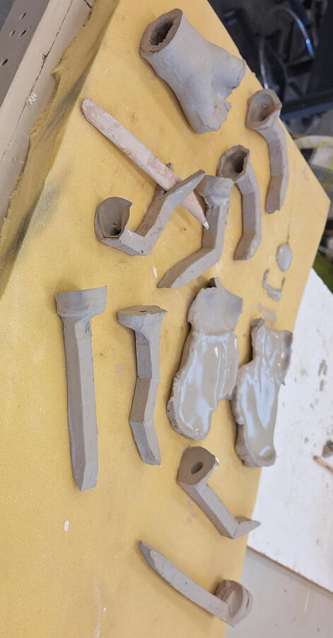 Blood on the Rails. Halloween project. 2023, slip, iron, wood, rock.